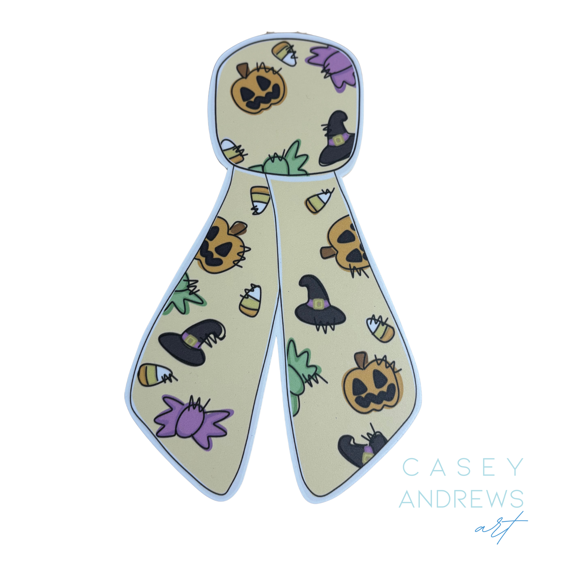 Halloween-themed scarf with pumpkins, ghosts, and candy corn on a beige background, featuring the brand 'Casey Andrews'.