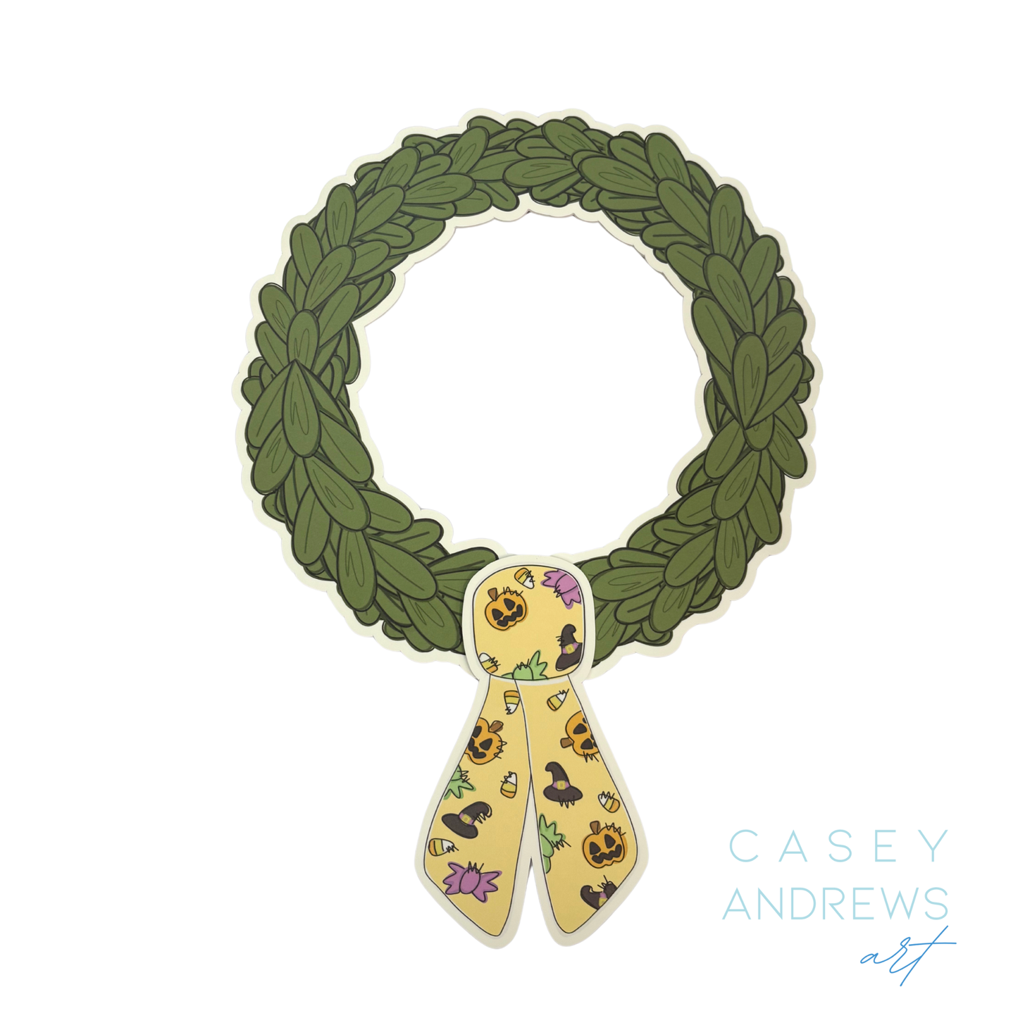 Decorative wreath with a yellow ribbon featuring Halloween designs on a white background, credited to Casey Andrews.