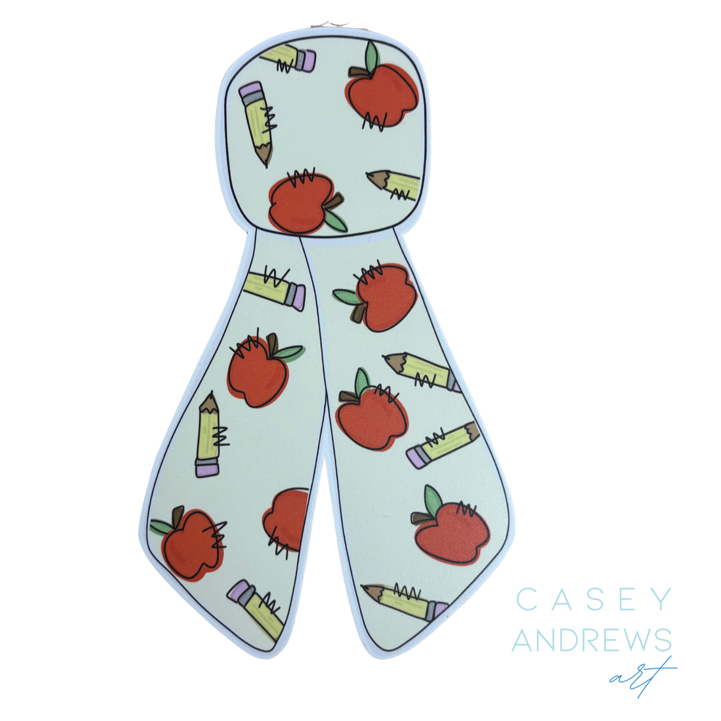 Scarf with apple and crayon pattern on a light blue background, featuring the brand 'Casey Andrews'.