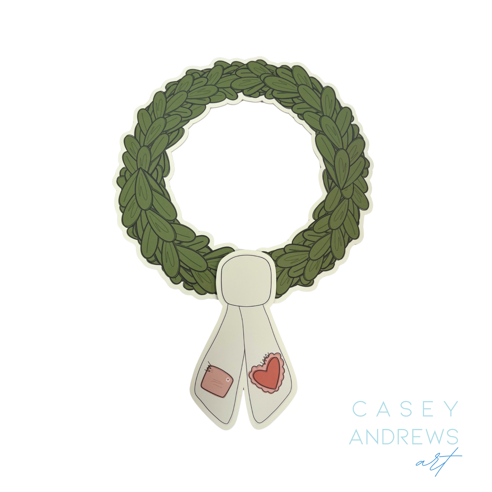Green wreath with a white ribbon featuring red hearts on a white background, credited to Casey Andrews art.